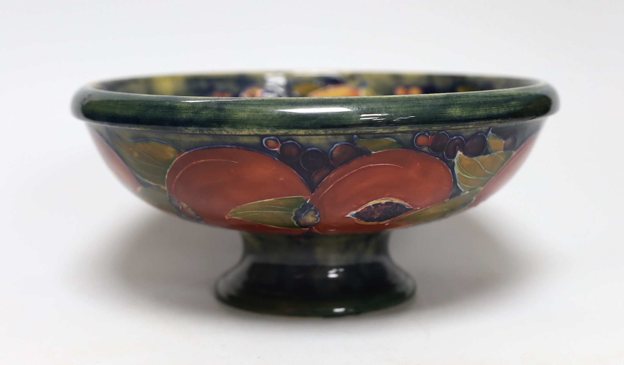 A Moorcroft Pomegranate pedestal bowl, 1920s, 23.5cm diameter